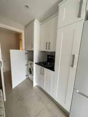 Una cocina o zona de cocina en Apartamento en S'agaró con piscina, ideal para familias