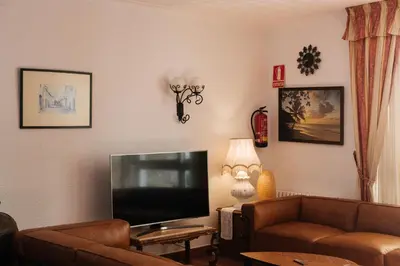 Una televisión o centro de entretenimiento en Mallorca Boutique Hotel