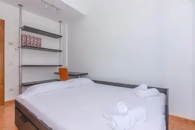 Cama o camas de una habitación en HomeHolidaysRentals Escapade