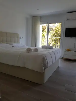 Cama o camas de una habitación en Krm Suite Apartament