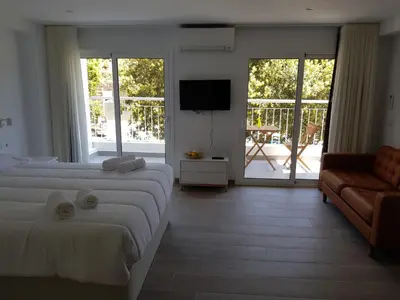 Cama o camas de una habitación en Krm Suite Apartament