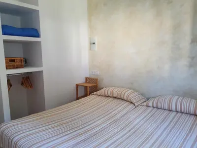 Cama o camas de una habitación en Apartaments Les Roques