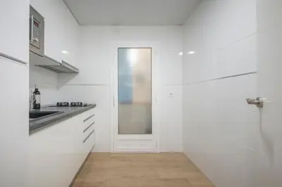 Una cocina o zona de cocina en Apartamento a 100 metros de la playa