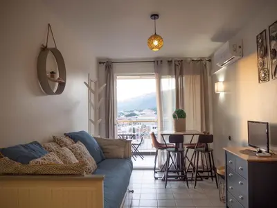 Zona de estar de Catalunya Apartament per 4 persones en edifici del passeig marítim amb vistes sobre la Vall d'Aro