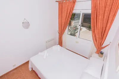 Cama o camas de una habitación en HomeHolidaysRentals Aube