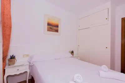 Cama o camas de una habitación en HomeHolidaysRentals Aube