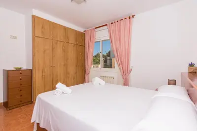 Cama o camas de una habitación en HomeHolidaysRentals Aube