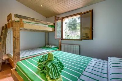 Cama o camas de una habitación en Vivalidays Can Palomo