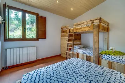Cama o camas de una habitación en Vivalidays Can Palomo