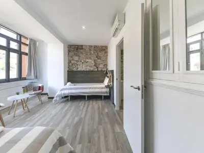 Cama o camas de una habitación en Bravissimo Rambla Eiffel Bridge 2