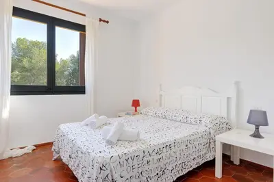 Cama o camas de una habitación en La Quinta Punyeta