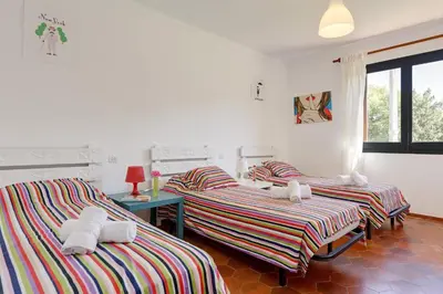 Cama o camas de una habitación en La Quinta Punyeta