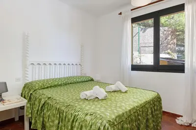 Cama o camas de una habitación en La Quinta Punyeta
