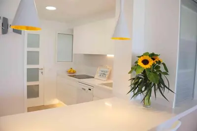 Una cocina o zona de cocina en Apartamento frente al mar