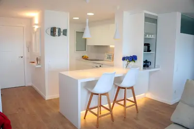 Una cocina o zona de cocina en Apartamento frente al mar