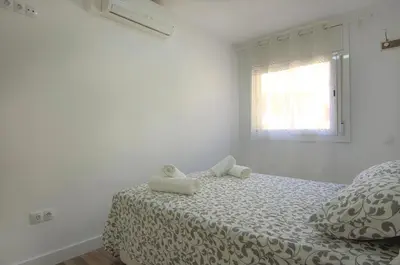 Cama o camas de una habitación en Apartment Ronda Sant Antoni