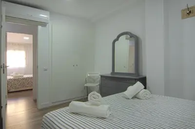 Cama o camas de una habitación en Apartment Ronda Sant Antoni