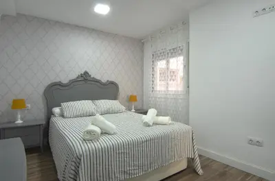 Cama o camas de una habitación en Apartment Ronda Sant Antoni