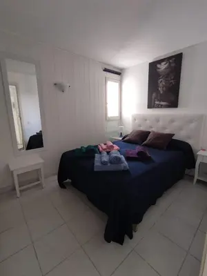 Cama o camas de una habitación en Excepcional 1ª línea de mar Platja d'Aro Elypalace 10-2