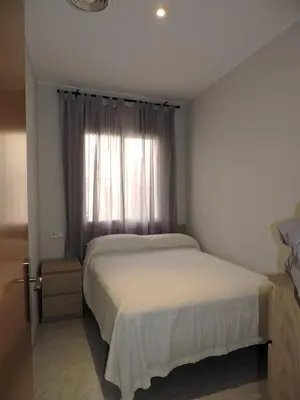 Cama o camas de una habitación en Carrer Sant Pere Pescador 20