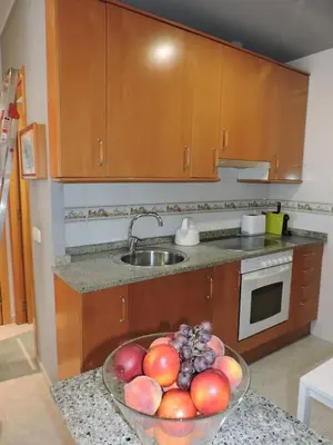 Una cocina o zona de cocina en Carrer Sant Pere Pescador 20