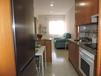 Una cocina o zona de cocina en Carrer Sant Pere Pescador 20