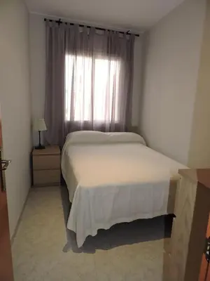 Cama o camas de una habitación en Carrer Sant Pere Pescador 20