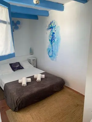 Cama o camas de una habitación en Hotel Bergantí