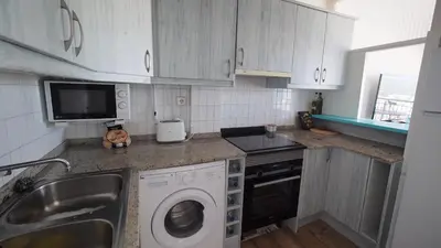 Una cocina o zona de cocina en Apartament Núria
