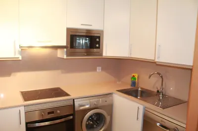 Una cocina o zona de cocina en Piso Regina