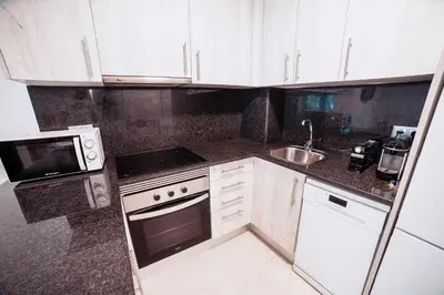 Una cocina o zona de cocina en Apartamento reformado a 2 minutos de la playa en Calella!