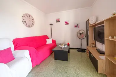 Una televisión o centro de entretenimiento en Apartamentos Costa Brava Las Vistas