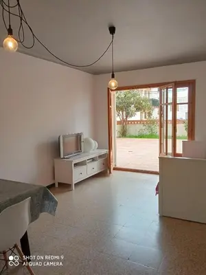 Cama o camas de una habitación en Apartament amb dues grans terrasses de 50 m2 i 16 m2 a 300 m de la platja