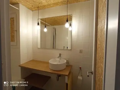 Un baño de Apartament amb dues grans terrasses de 50 m2 i 16 m2 a 300 m de la platja