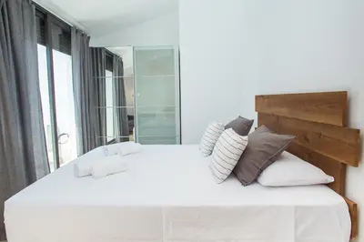 Cama o camas de una habitación en AL27 Duplex de diseño a 250 metros de la playa