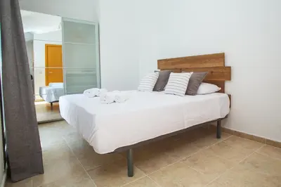 Cama o camas de una habitación en AL27 Duplex de diseño a 250 metros de la playa