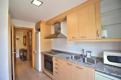 Una cocina o zona de cocina en AL07 Apartamento a 300 metros de la playa de Fenals