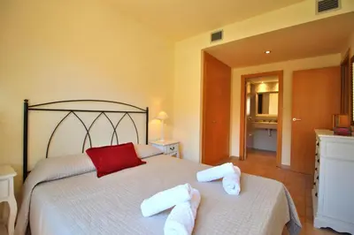 Cama o camas de una habitación en AL07 Apartamento a 300 metros de la playa de Fenals