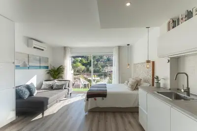 Zona de estar de Lets Holidays AMAZING STUDIO in the CENTER of TOSSA