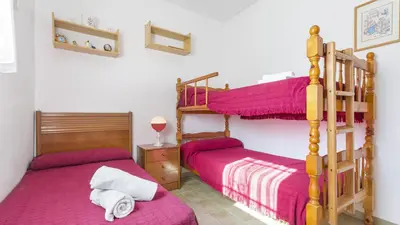 Cama o camas de una habitación en 2Tere - Lloret de Mar