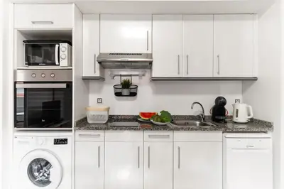 Una cocina o zona de cocina en Tic Tac 31 Family apartment with pool view