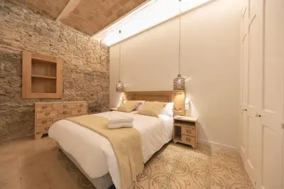 Cama o camas de una habitación en Bravissimo Mercaders, beautiful 3 bedroom apartment