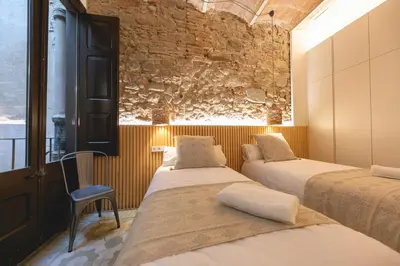 Cama o camas de una habitación en Bravissimo Mercaders, beautiful 3 bedroom apartment