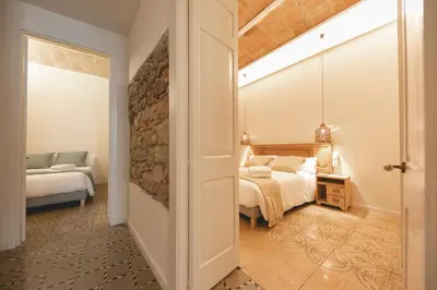 Cama o camas de una habitación en Bravissimo Mercaders, beautiful 3 bedroom apartment