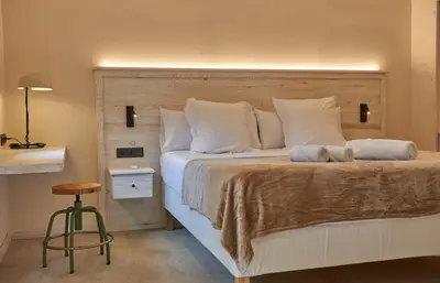Cama o camas de una habitación en L'Aixart Aiguablava Hotel