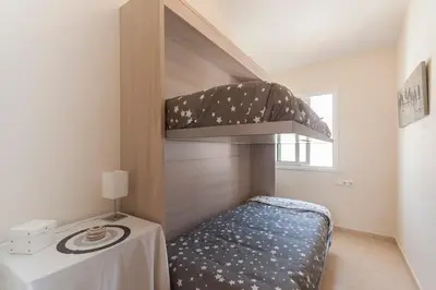 Cama o camas de una habitación en Lets Holidays Centric apartment with parking 2
