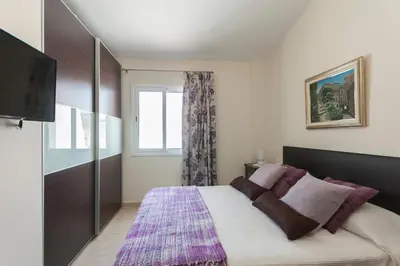 Cama o camas de una habitación en Lets Holidays Centric apartment with parking 2
