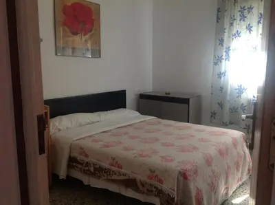 Cama o camas de una habitación en Hostel Alhambra
