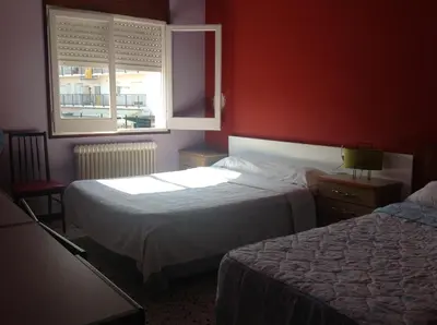 Cama o camas de una habitación en Hostel Alhambra