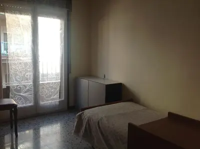 Cama o camas de una habitación en Hostel Alhambra
